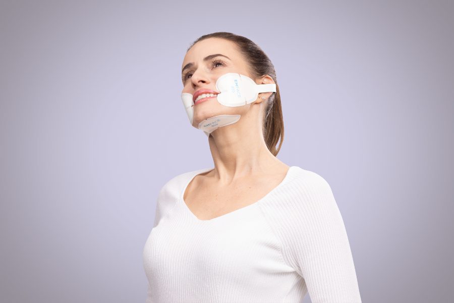 
        Happy patient after EmFace facial rejuvenation